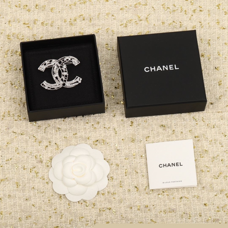 Ch*el brooches